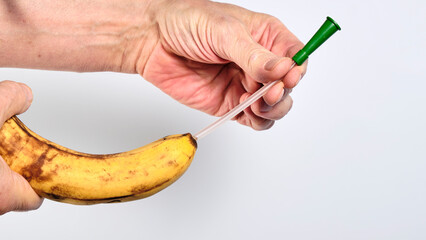 how to use a male urological catheter using a banana as an example