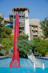 Colorful waterslides in water park.