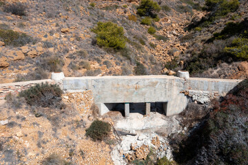 Aerial drone photo of a large storm drain located in the town of Benidorm in Spain on a hot sunny summers day