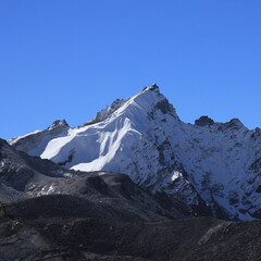Moraine of the Khumbu Glacier and peak seen from Gorakshep, Nepal.