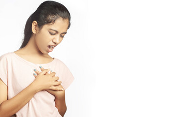 teenage girl suffering pain in the breast or chest - obrazy, fototapety, plakaty