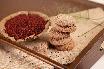 Ragi cookies on wooden tray