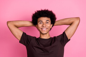 Portrait of young handsome satisfied guy curly hair take nap wake up after chill time with friends isolated over pink color background