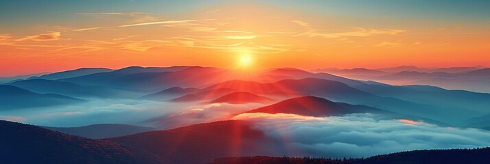 Fototapeta premium The sun dips below the horizon, casting a warm glow over the towering mountain peaks