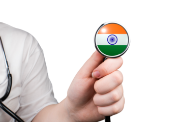 The head of a medical stethoscope in the form of an Indian flag in a hand (close-up) on a transparent background. Indian medicine concept