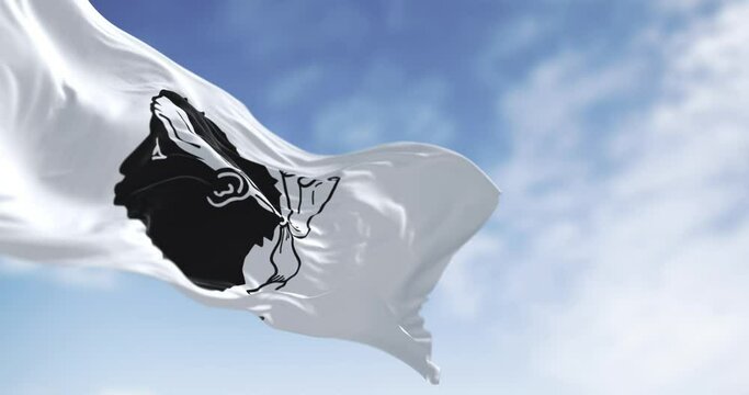 Flag of Corsica waving in the wind on a clear day