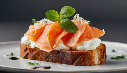 Close-up of toasted bread with smoked salmon and cream cheese. Tasty food. Delicious snack.