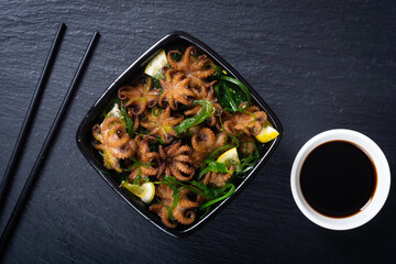 Baby octopus fried with lemon
