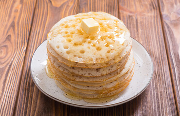 Moroccan traditional eating . Pancakes with honey