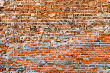 Naklejka premium Brick Wall Background. Vintage red brick wall texture for design.