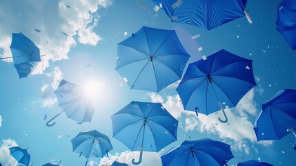 Transform a typical scene of blue sky into a dynamic visual by featuring a collection of modern umbrellas Let the simplicity of the design speak volumes in a captivating long shot - obrazy, fototapety, plakaty
