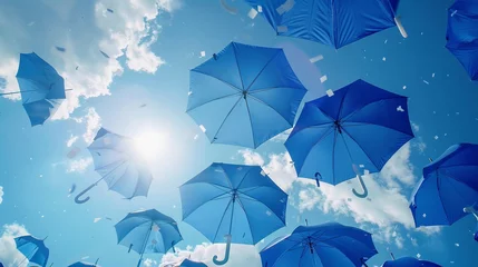 Poster Transform a typical scene of blue sky into a dynamic visual by featuring a collection of modern umbrellas Let the simplicity of the design speak volumes in a captivating long shot © Yubanpot
