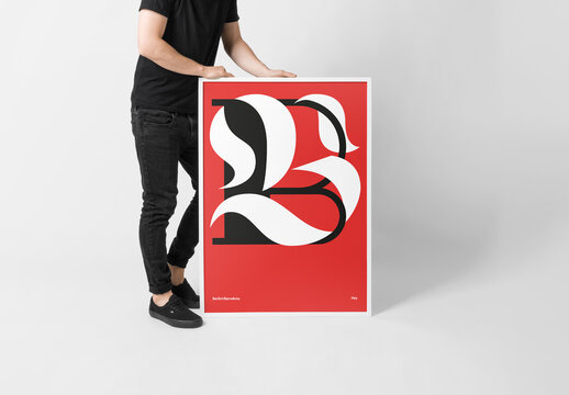 Man Holding Poster Mockup