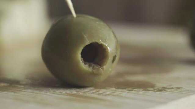 pitted green olive pick with toothpick appetiser healthy natural organic food