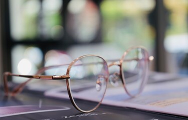 glasses on a table, Eyeglasses on table, progressive lenses, eyeglasses for the elderly, glasses...
