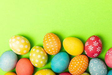 Easter eggs on a bright background. Easter celebration concept. Colorful easter handmade decorated...
