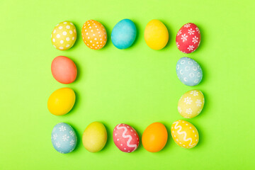 Easter eggs on a bright background. Easter celebration concept. Colorful easter handmade decorated Easter eggs. Place for text. Copy space.