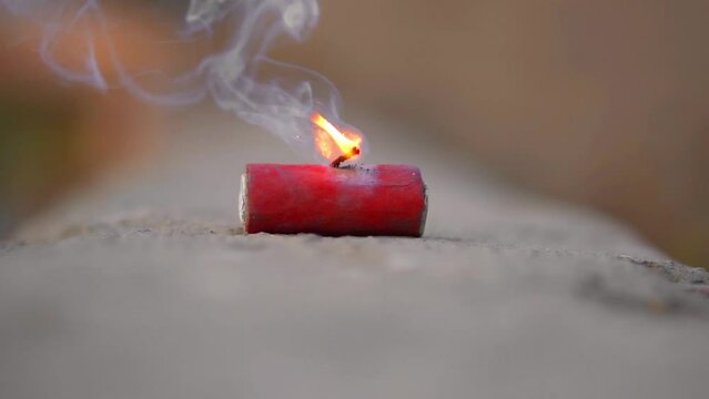 happy diwali slow motion, cracker blowing blurred background, sparkles slow motion fire cracker