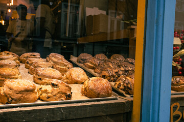 a display case with pastries