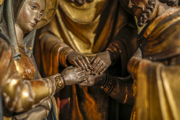 Notre Dame du Sablon catholic church, Brussels, Belgium. Detail of a relief depicting the wedding of Mary and Joseph - obrazy, fototapety, plakaty
