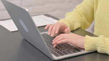 Close Up of Woman Typing on Laptop