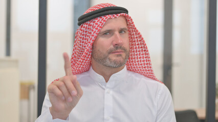 Portrait of Tense Arab Man in Denial