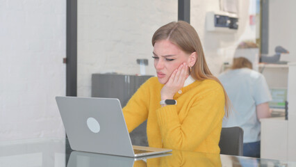 Blonde Casual Woman with Toothache in Office
