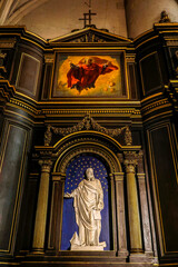 Relief  and fresco in Saint Gervais-Saint Protais catholic church, Paris, France. Saint...