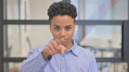 Portrait of African Woman Pointing at Camera