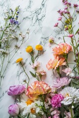 Obraz na płótnie Canvas Realistic photo of colorful fresh flowers on a pastel marble backgound