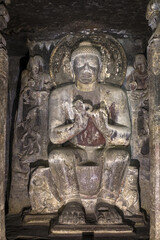 Ajanta caves, a UNESCO World Heritage Site in Maharashtra, India. Cave 16.  Statue of Seated Buddha...