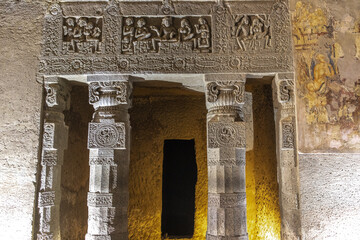 Ajanta caves, a UNESCO World Heritage Site in Maharashtra, India. Columns and reliefs in cave nÂ°21
