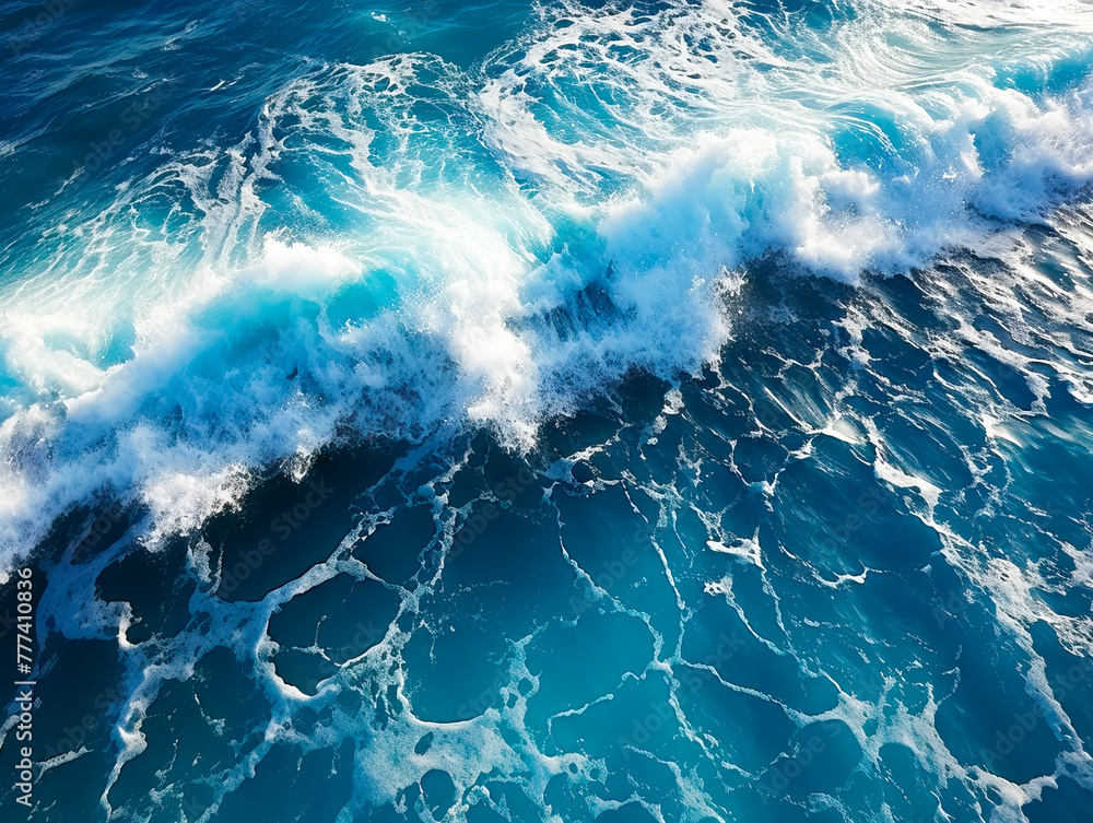 Poster aerial view of dynamic ocean waves with white foam on blue water, showing the concept of nature's po