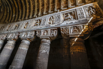 Ajanta caves, a UNESCO World Heritage Site in Maharashtra, India. Inside worship hall of cave 19 - obrazy, fototapety, plakaty