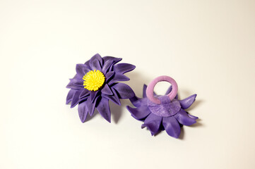 A two handmade artificial flowers	
