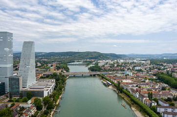 Fototapeta na wymiar Basel, Switzerland. Rhine river with lock and dam. Summer day. Aerial view