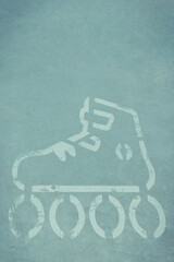 Sign of rolls on asphalt street. Safety during active resting. Marking for skaters