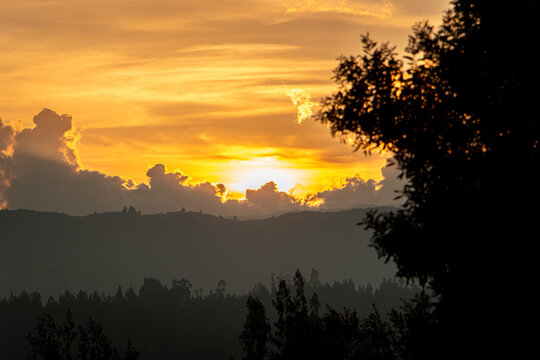 Sunset over the clouds