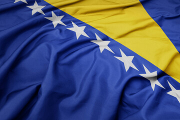 waving colorful national flag of bosnia and herzegovina.