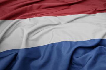 waving colorful national flag of netherlands.