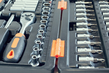Professional car repair kit, tool box containing adjustable tools, adapters, sockets and bits for any task.