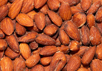 close up of many roasted almonds