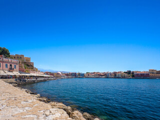 Fototapeta na wymiar Old Venetian port town in Greece on a clear day (Chania, Crete, Greece)