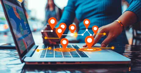 Local search engine optimization concept with people placing location pins on laptop screen, marketing strategy to improve online visibility and attract nearby customers - obrazy, fototapety, plakaty