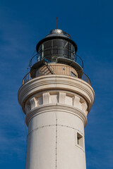 the top of a white lighthouse