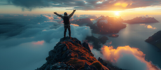 A climber reaches the summit of an exposed mountain top - obrazy, fototapety, plakaty