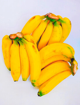 Banana fruit bunches fresh yellow ripe bananas bunch kela banana-fruit cavendish musa organic food closeup view image photo 