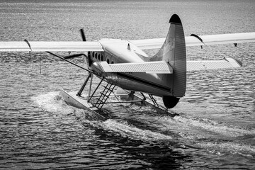 De Havilland Otter floatplane taxiing in water