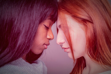 Silent connection between diverse friends. This intimate moment highlights the unspoken bond and...