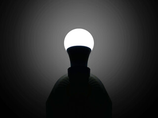 glowing light bulb on black background